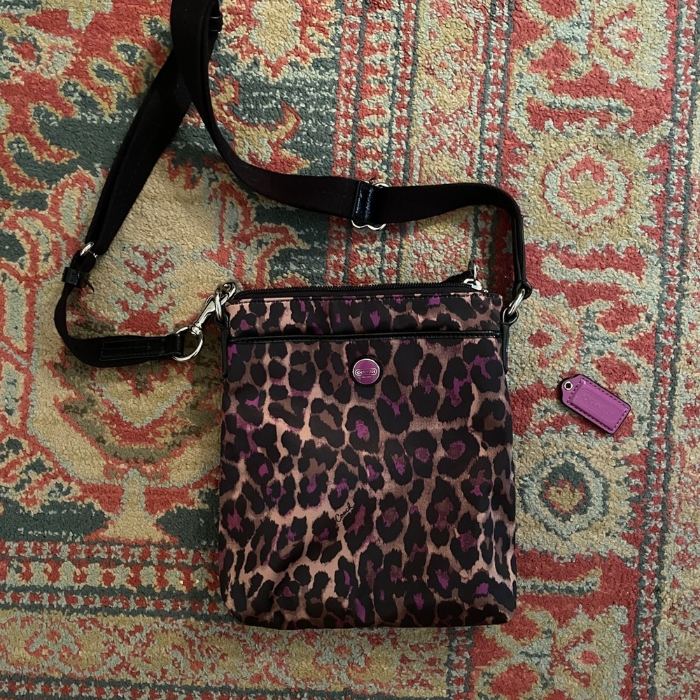 Like New purple leopard print Coach bag